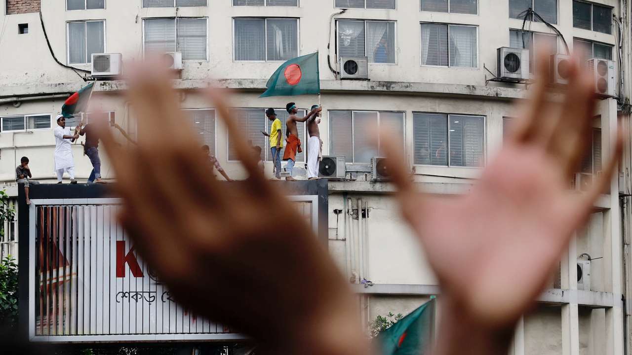 People celebrate the resignation of Bangladeshi Prime Minister Hasina in Dhaka