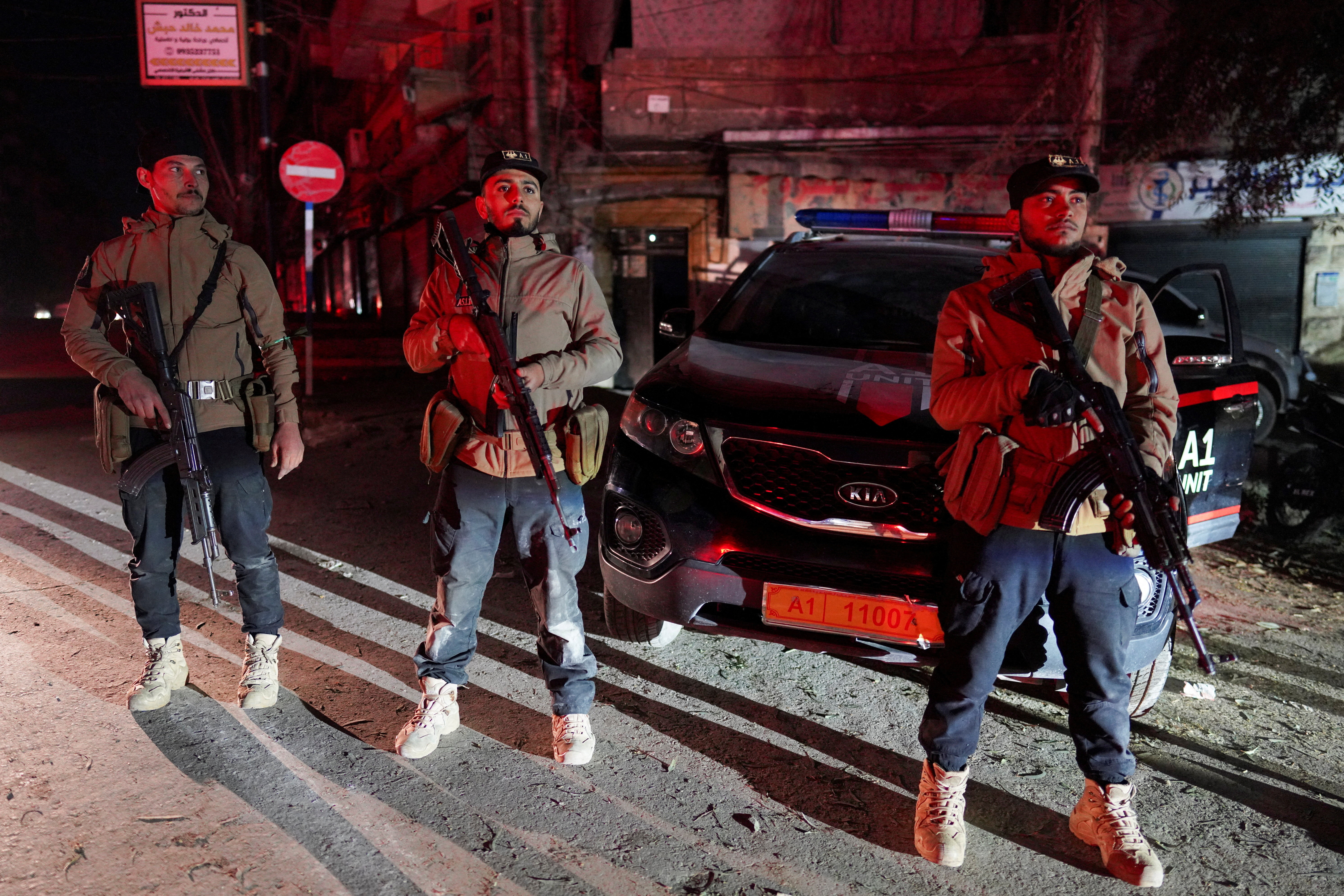 Security forces affiliated with the Ministry of the Interior stand guard in the Ashrafieh neighbourhood, which they have taken control of, according to the Ministry of the Interior, following battles with the Syrian Democratic Forces, in Aleppo