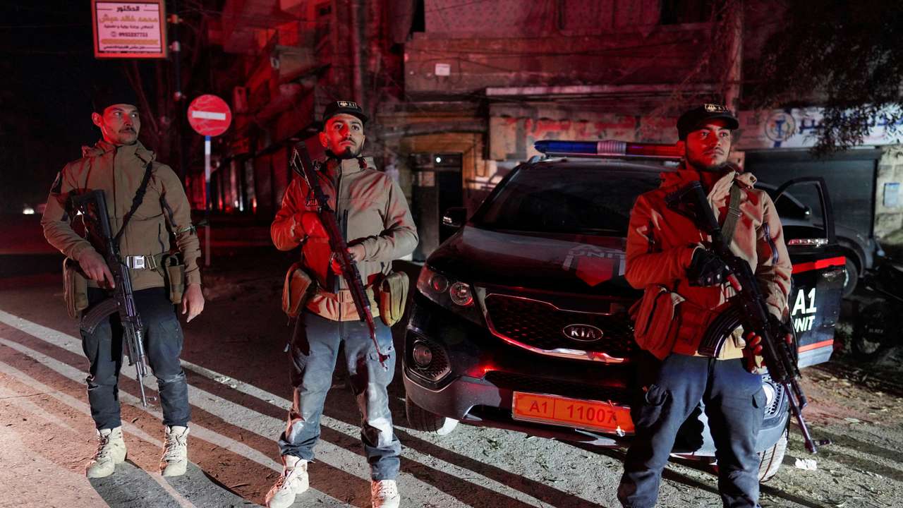 Security forces affiliated with the Ministry of the Interior stand guard in the Ashrafieh neighbourhood, which they have taken control of, according to the Ministry of the Interior, following battles with the Syrian Democratic Forces, in Aleppo