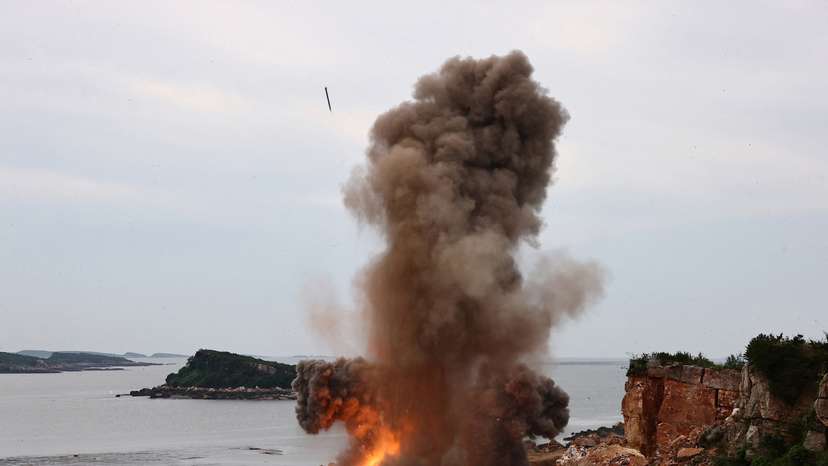 North Korea's Kim attends test-firing of rocket launcher