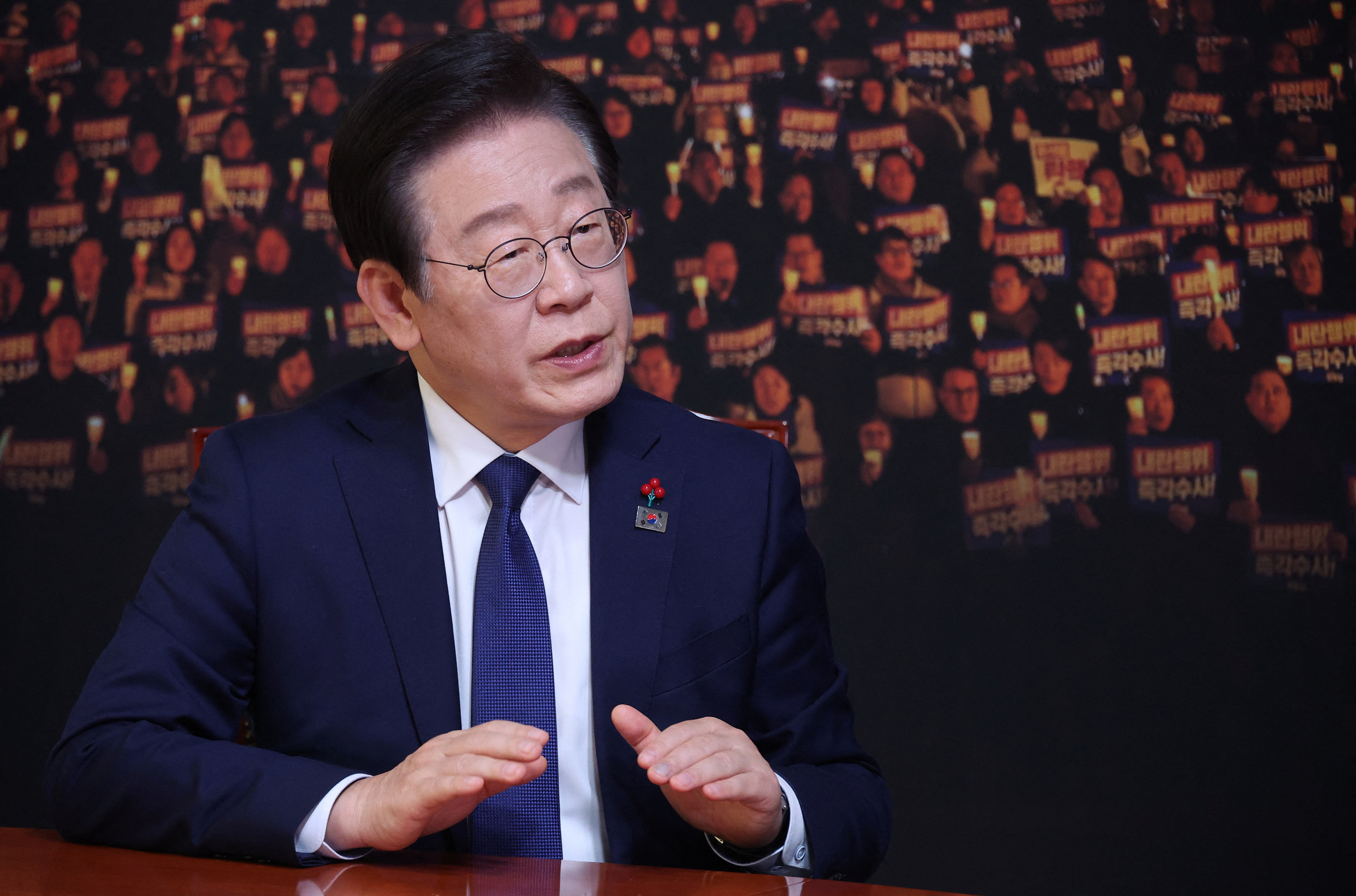 South Korea's main opposition Democratic Party leader Lee Jae-myung speaks during an interview with Reuters