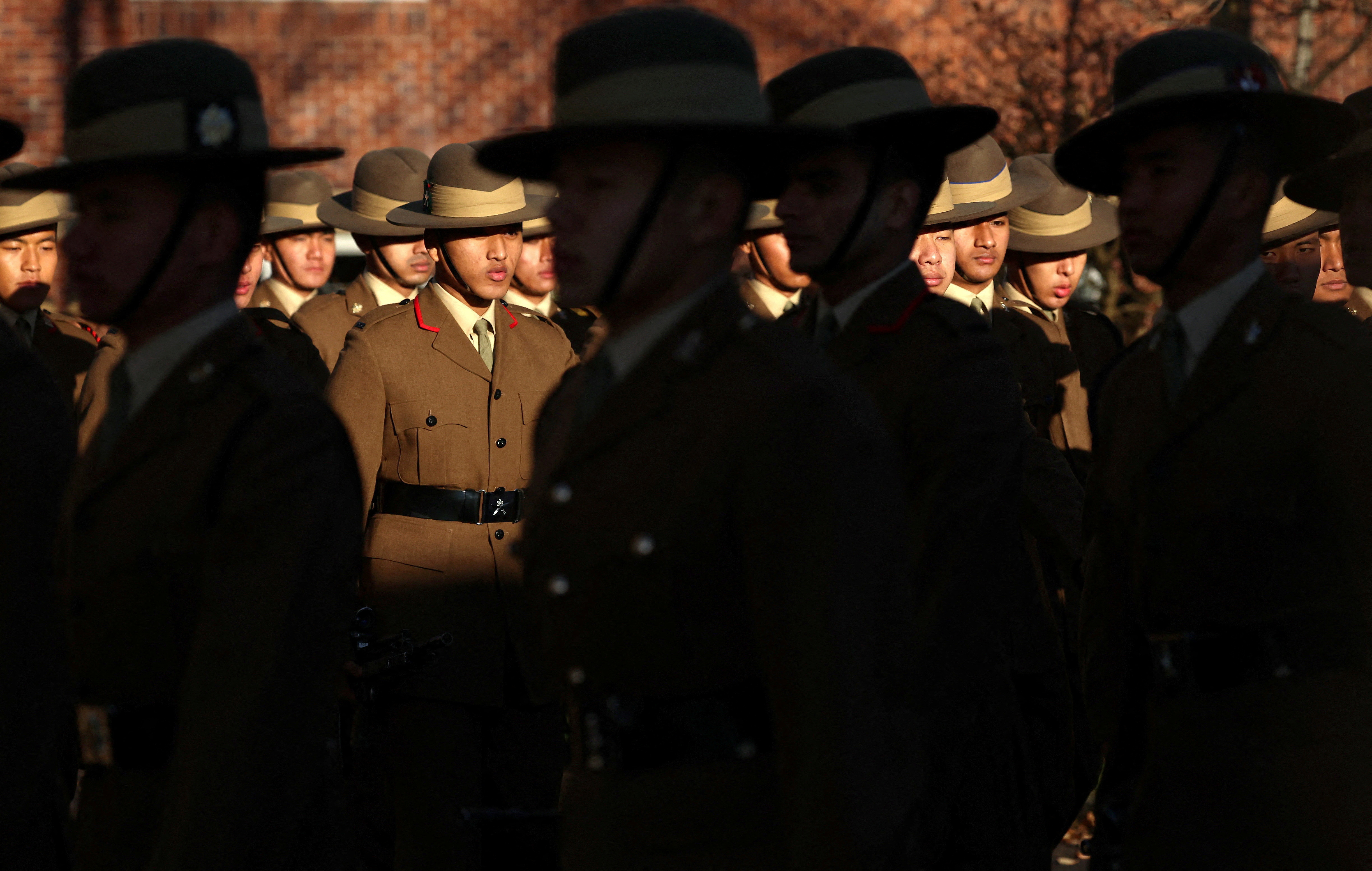 FILE PHOTO: Soldiers from the Brigade of Gurkhas march on the Parade Ground during a passing out ceremony at Catterick Garrison near Richmond