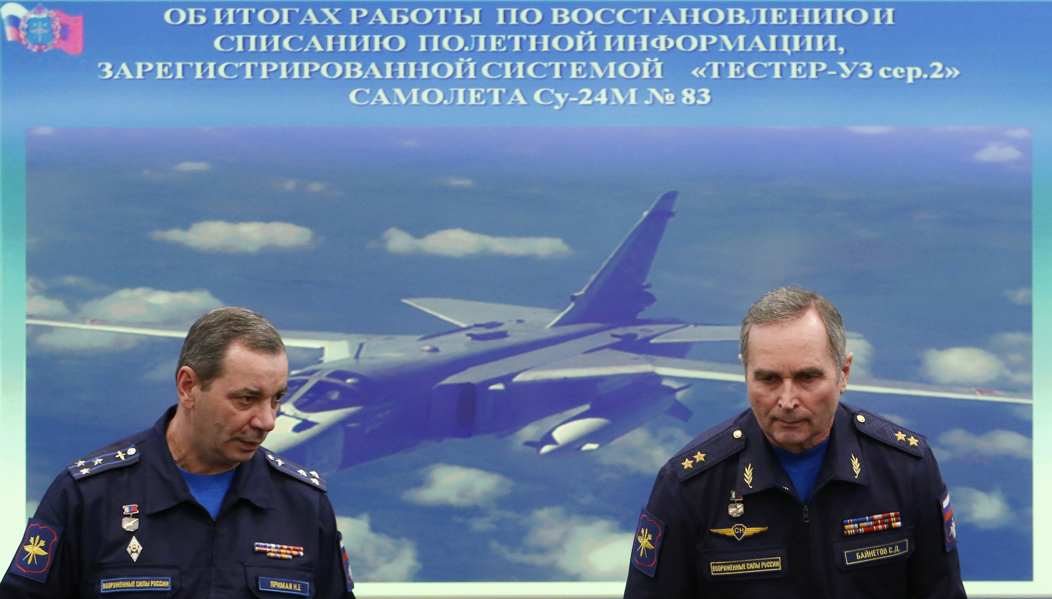 Deputy chief of the Russian Armed Forces' flight safety service Bainetov and Chairman of the Air Accident Investigation Commission Primak attend a news conference in Moscow
