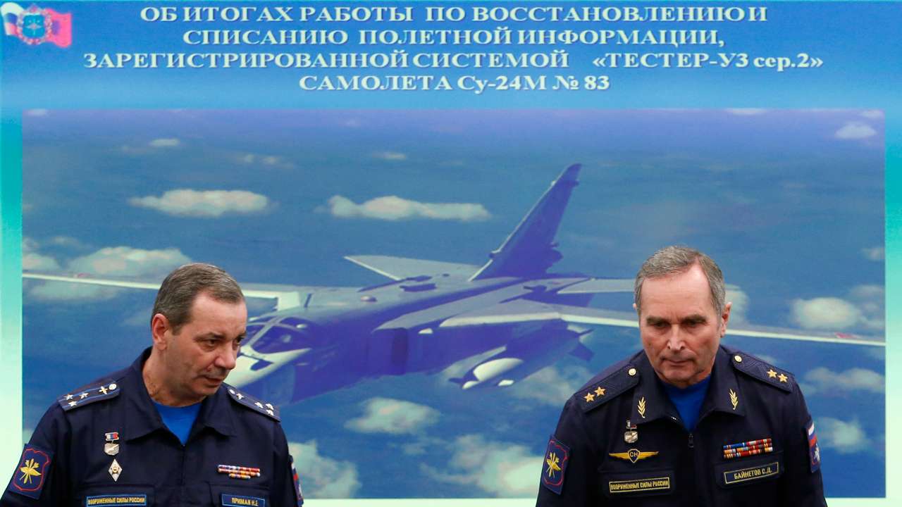 Deputy chief of the Russian Armed Forces' flight safety service Bainetov and Chairman of the Air Accident Investigation Commission Primak attend a news conference in Moscow