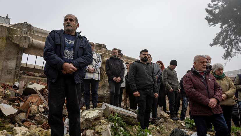 Worshippers attend a mass for those of their community killed by last year's earthquake at Greek Orthodox Church in Hatay