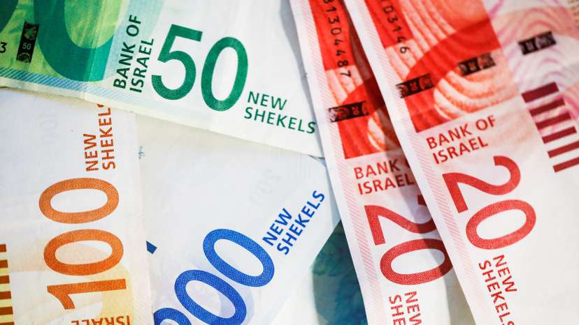New Israeli Shekel banknotes are seen in this picture illustration