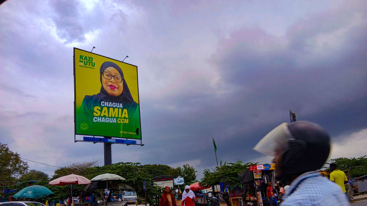 A roadside poster in Dar es Salaam displays Samia Suluhu Hassan, Tanzanian president