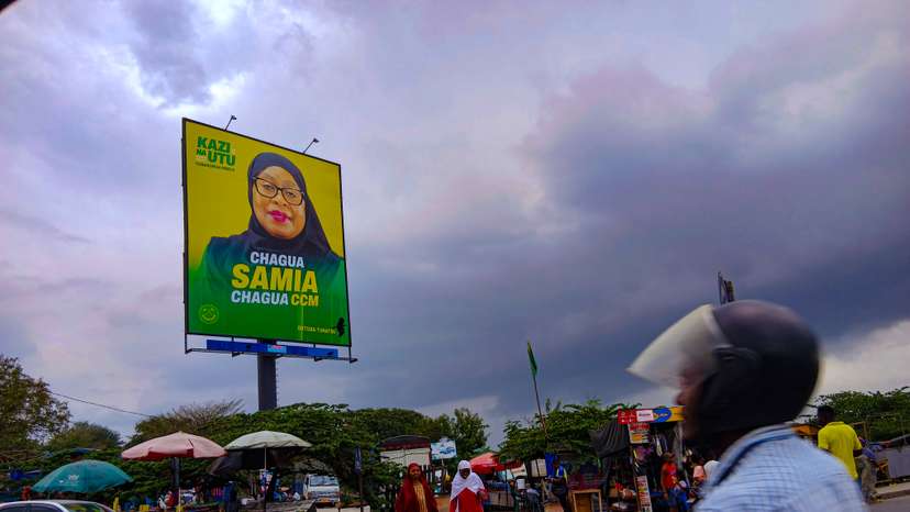 A roadside poster in Dar es Salaam displays Samia Suluhu Hassan, Tanzanian president