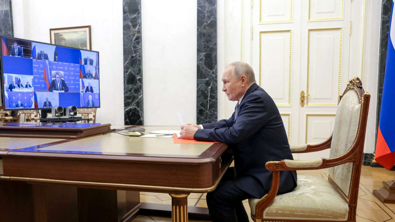 Russian President Vladimir Putin chairs a Security Council meeting in Moscow