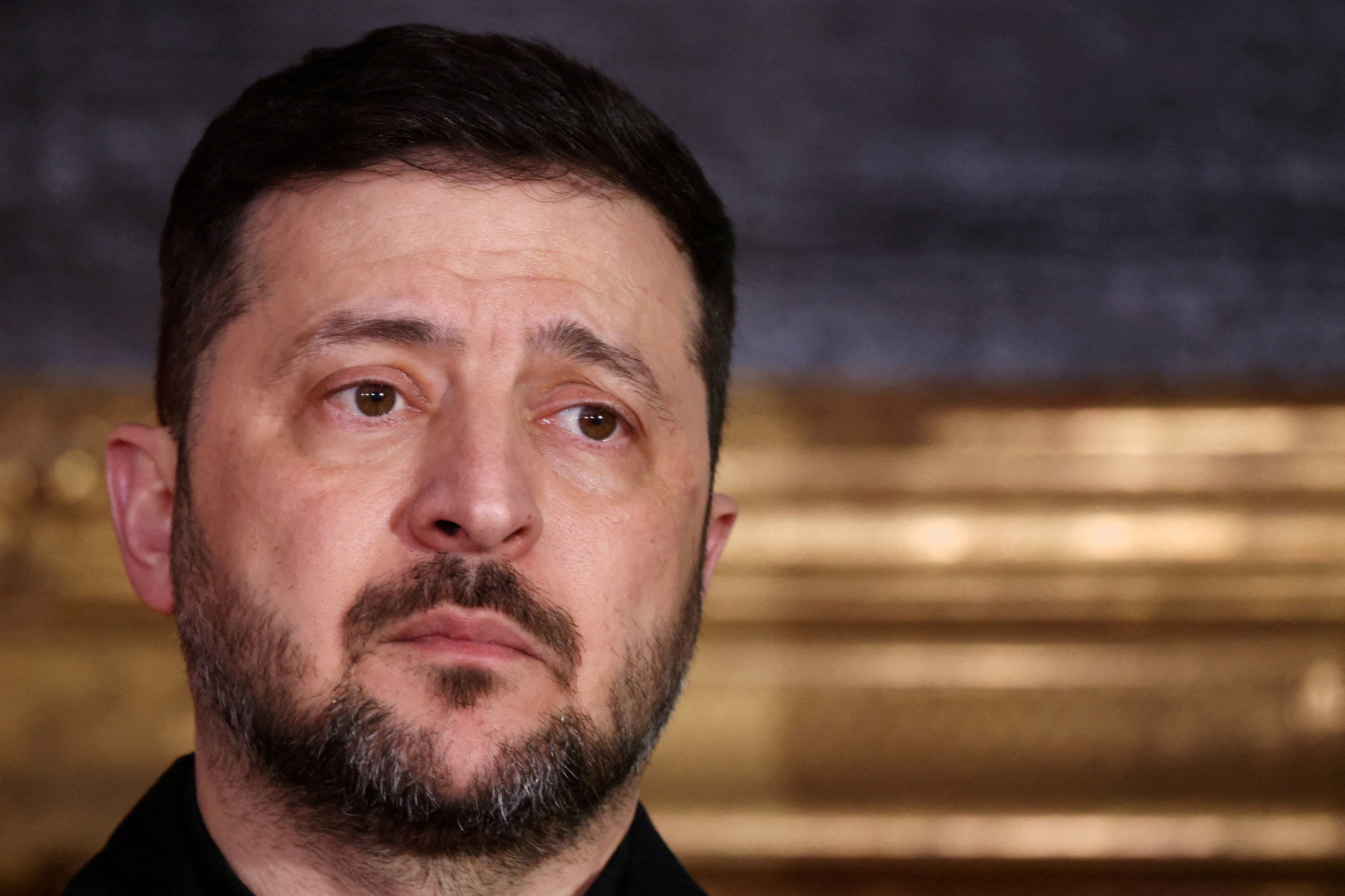 FILE PHOTO: Bavarian federal state prime minister Markus Soeder, chairman of the Munich Security Conference Wolfgang Ischinger, Polish Prime Minister Donald Tusk and Ukrainian President Volodymyr Zelenskiy deliver a statement during the Munich Security Con