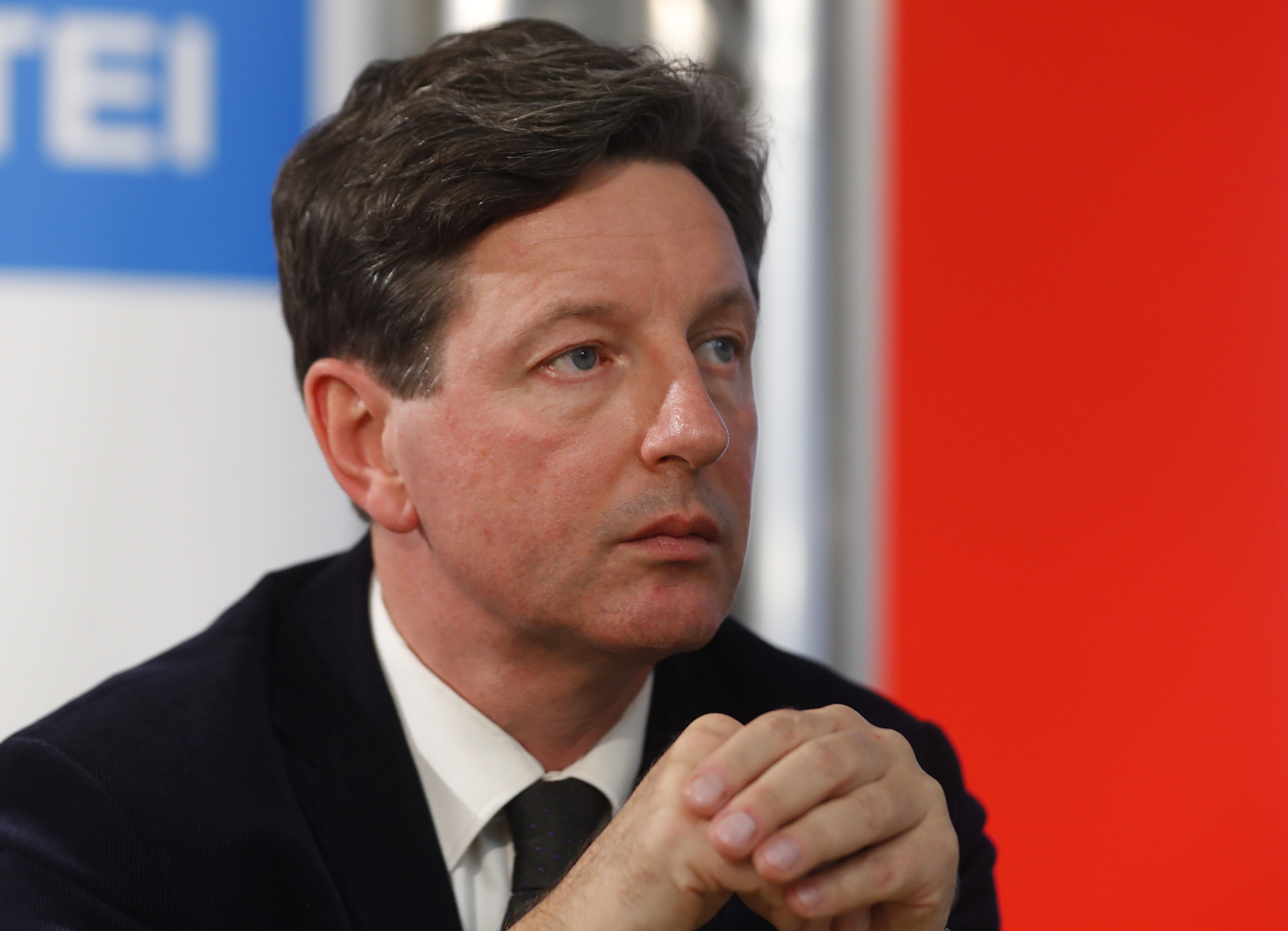 Nemeth of the FPOe listens during a news conference in Vienna