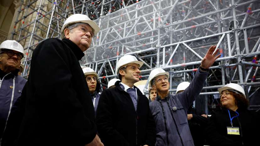 French President Macron visits Paris' Notre-Dame cathedral a year before its reopening