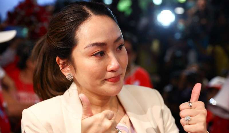 Pheu Thai's prime ministerial candidate, Paetongtarn Shinawatra, attends a birthday celebration held by red shirt supporters, a day ahead of her father, former Prime Minister Thaksin Shinawatra, coming home from self-exile in Bangkok