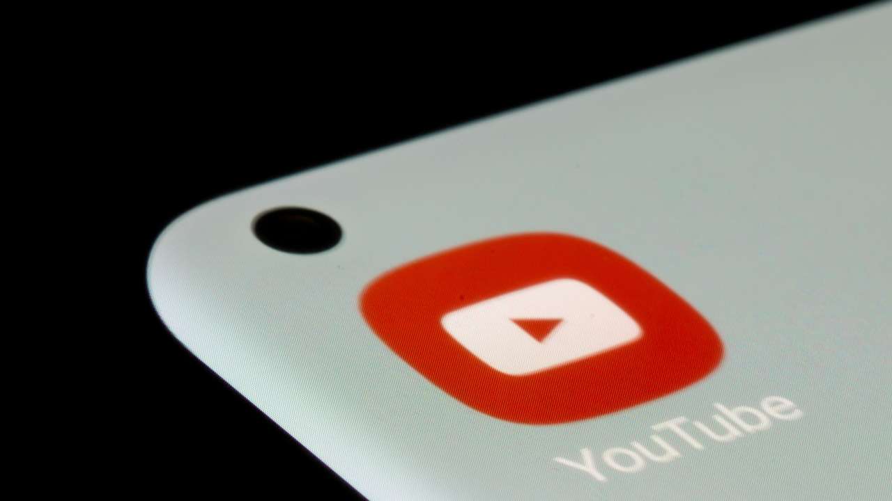 YouTube app is seen on a smartphone in this illustration