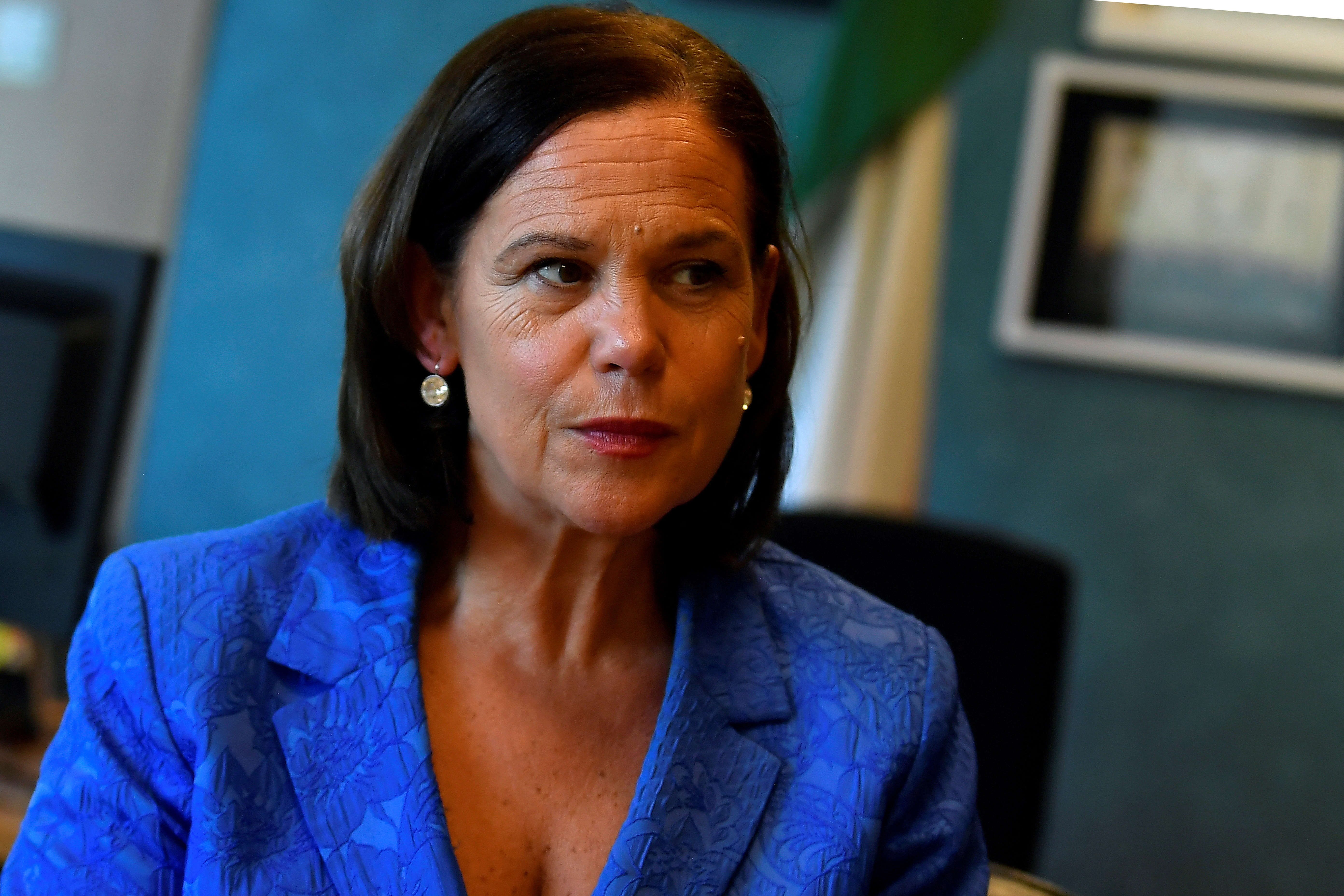 FILE PHOTO: Sinn Fein leader Mary Lou McDonald speaks during an interview, in Dublin