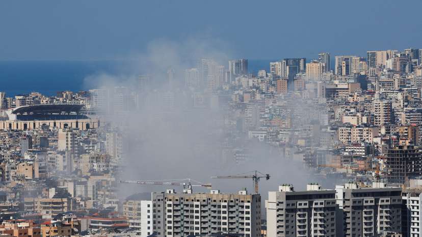 Smoke rises after an Israeli strike on Beirut's southern suburbs, following an escalation between Hezbollah and Israel amid the U.S.-Israel conflict with Iran