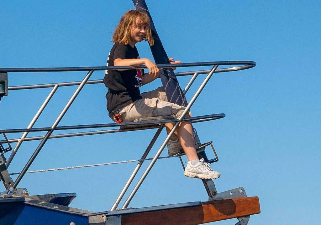 FILE PHOTO: Activist Greta Thunberg sits aboard the aid ship Madleen