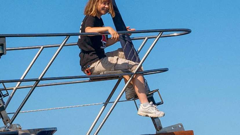 FILE PHOTO: Activist Greta Thunberg sits aboard the aid ship Madleen
