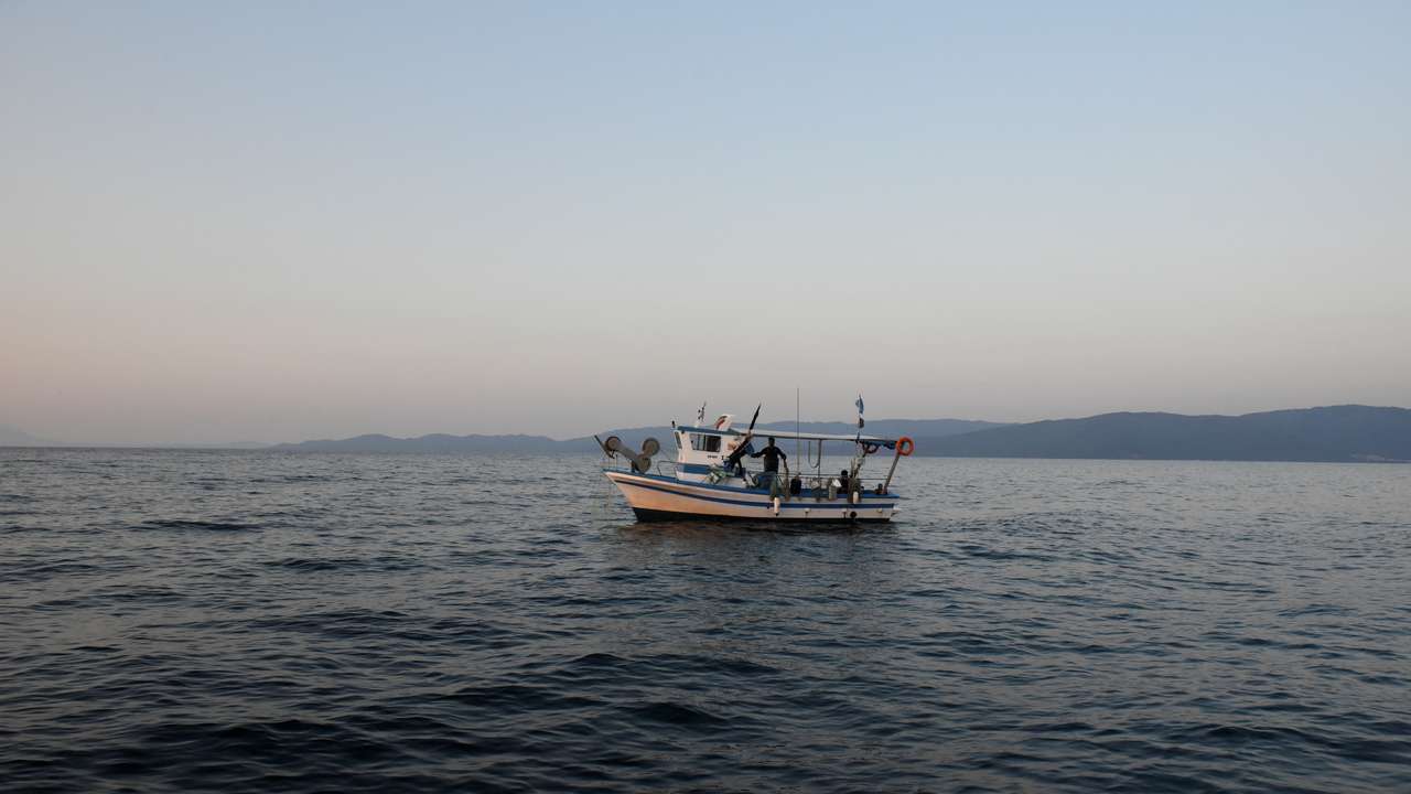 The Wider Image: As stocks deplete, Greek fishermen send boats to scrap
