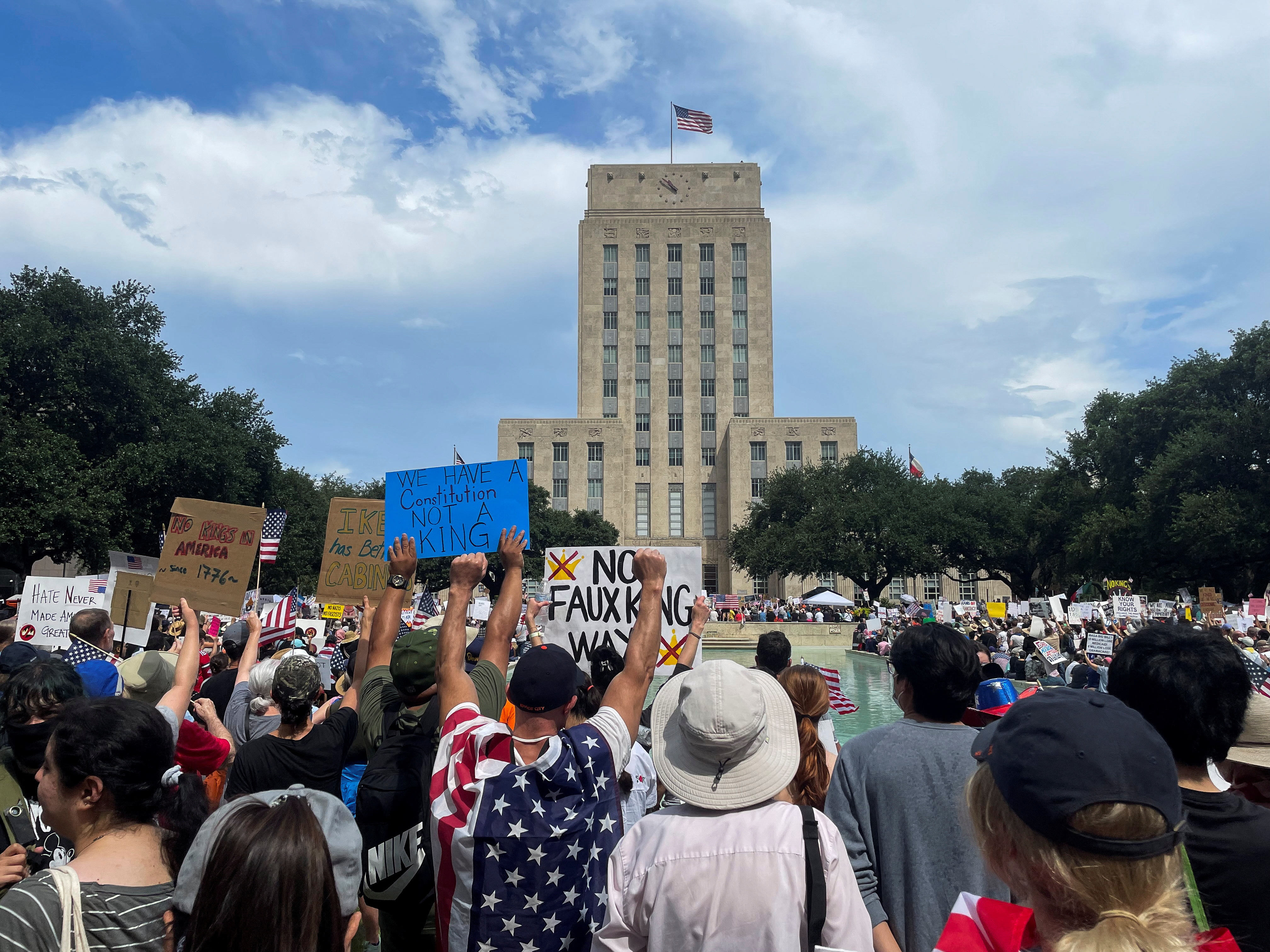 People participate in the "No Kings" rally, in Houston