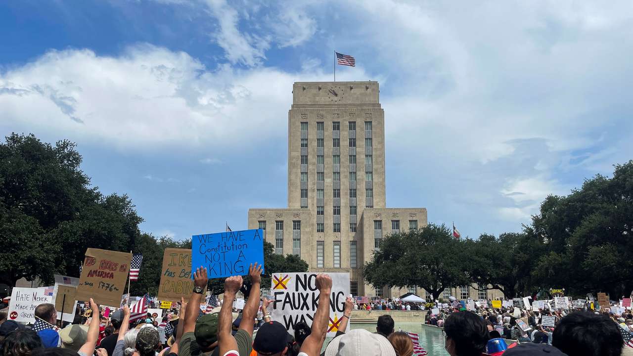 People participate in the "No Kings" rally, in Houston