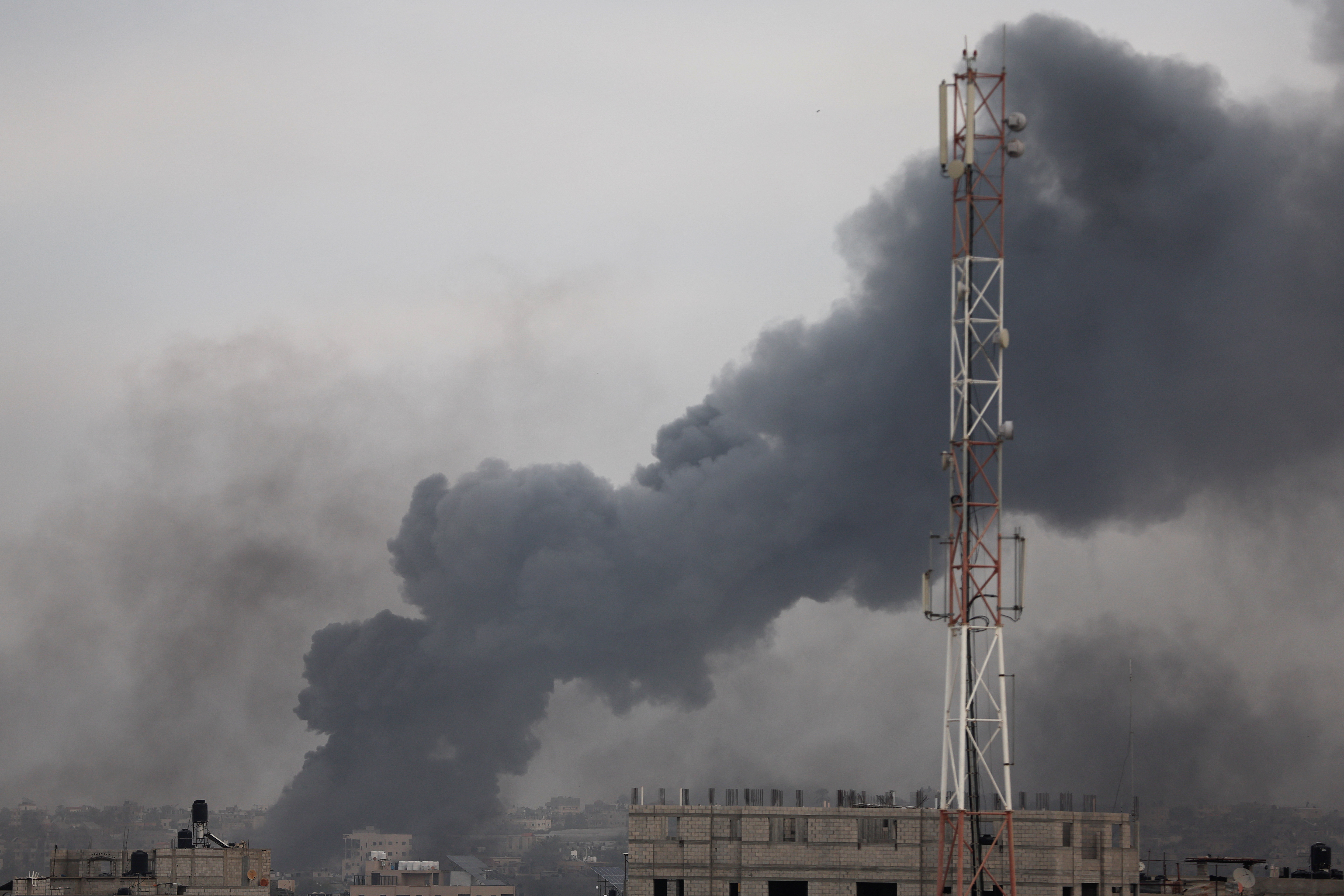 Smoke rises after Israeli strikes, in Khan Younis