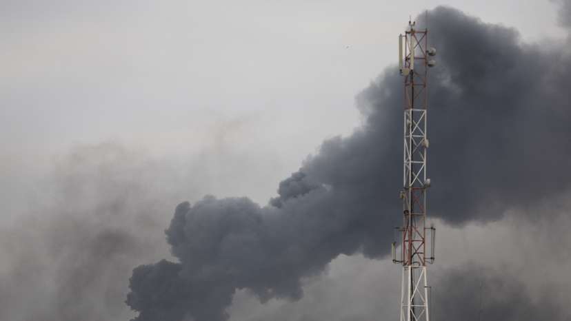 Smoke rises after Israeli strikes, in Khan Younis