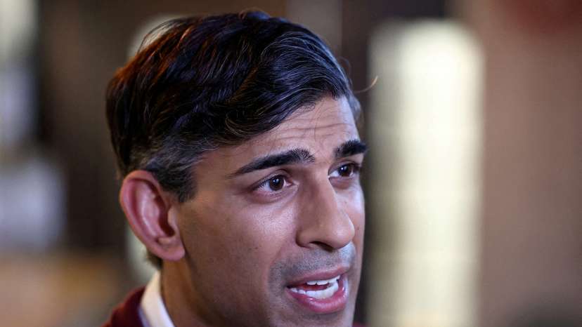 FILE PHOTO: Britain's Prime Minister Rishi Sunak visits Omnom, a restaurant and community centre, in London