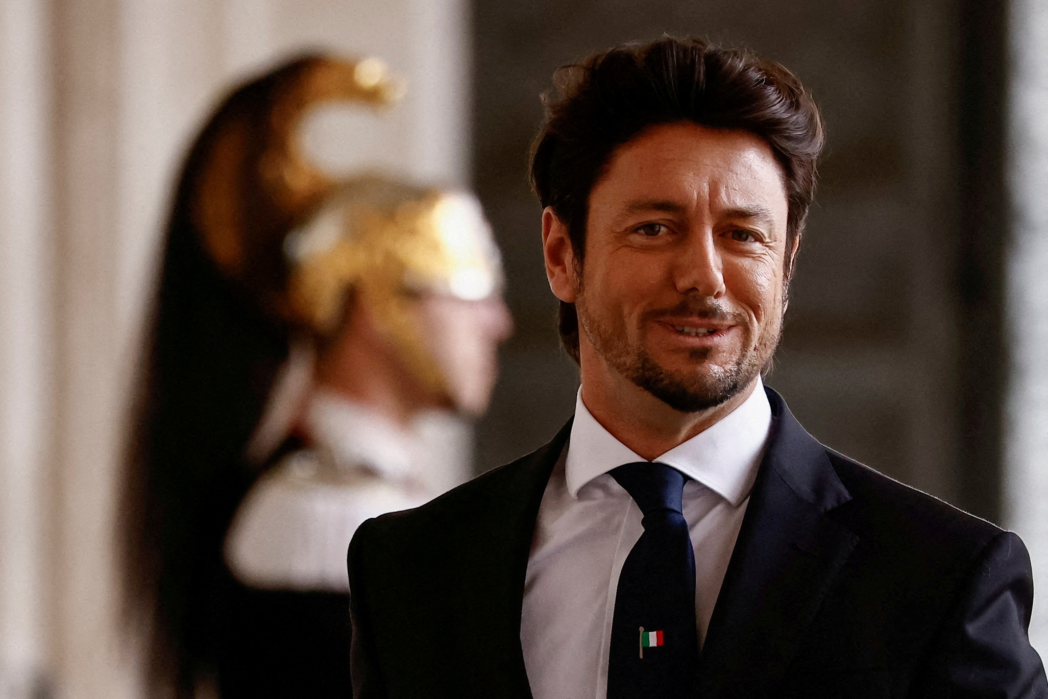 FILE PHOTO: Giambruno attends Meloni's swearing-in ceremony at Quirinale Palace, in Rome