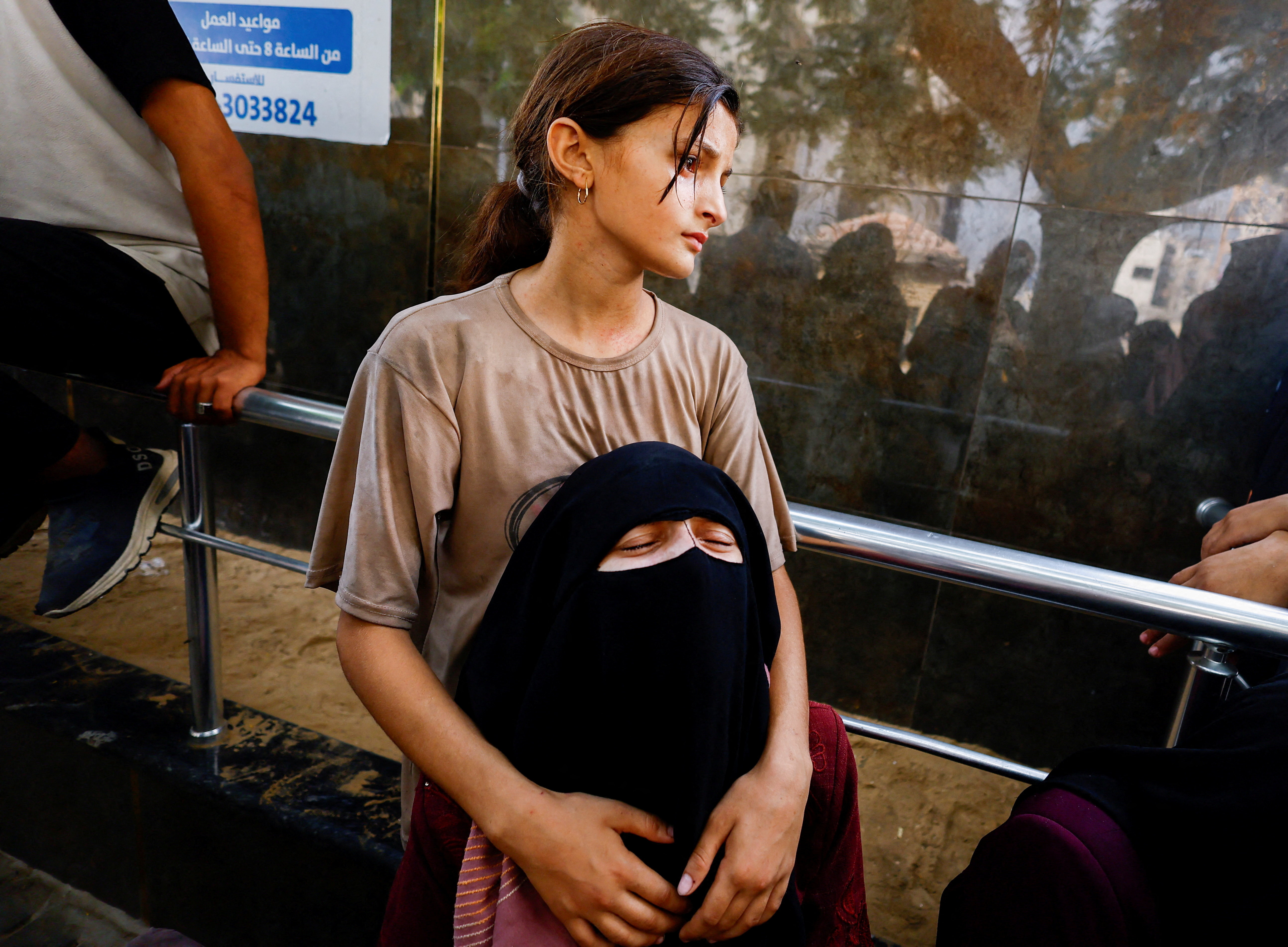 Palestinians mourn loved ones killed while seeking aid, in Gaza City