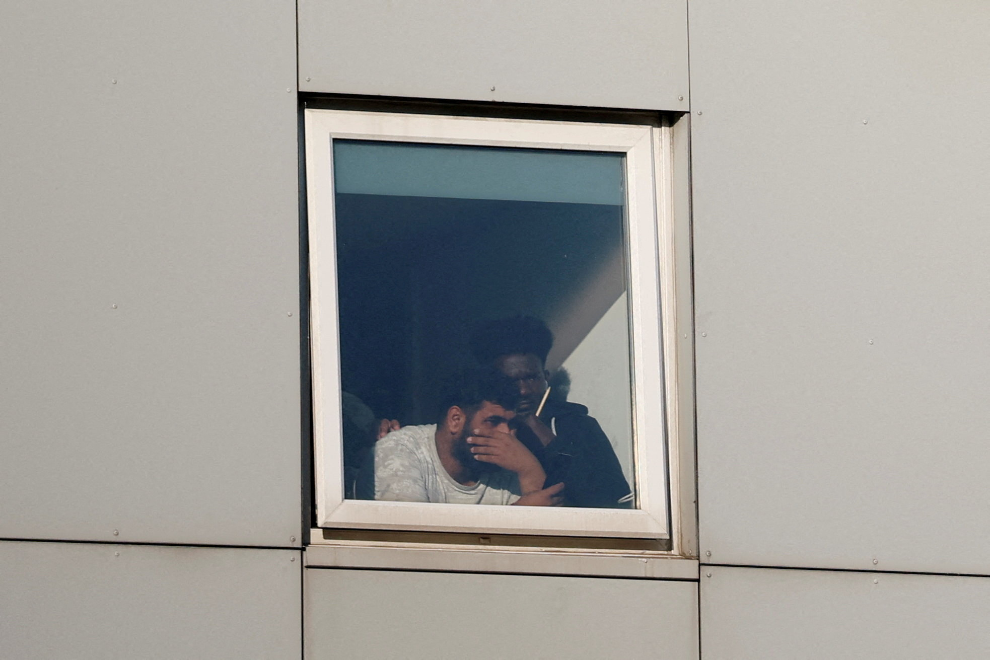 FILE PHOTO: Protesters gather at migrant hotels in cities across Britain