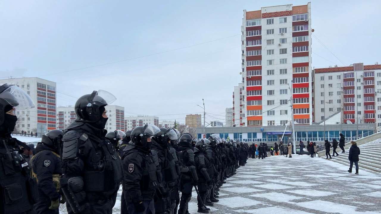 Law enforcement officers secure a square following a protest against the court verdict of a leading rights activist in Ufa