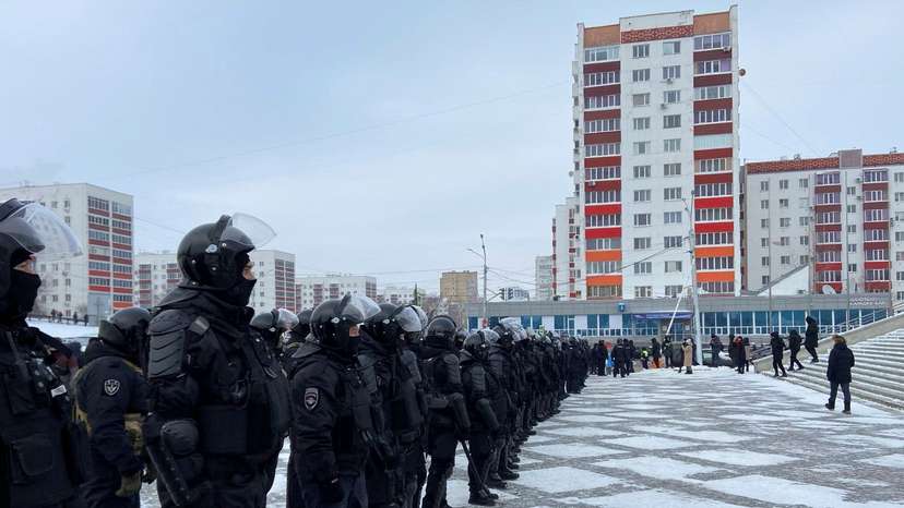 Law enforcement officers secure a square following a protest against the court verdict of a leading rights activist in Ufa