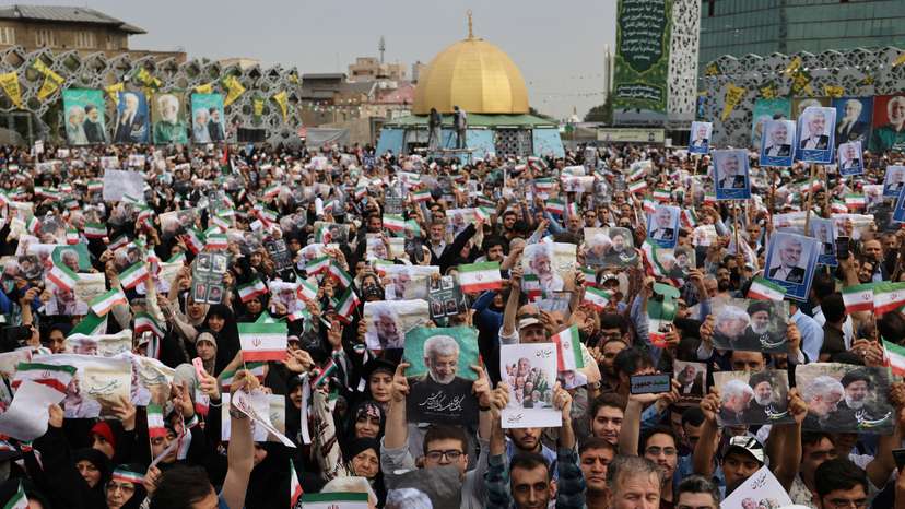 Supporters of Iranian presidential candidate Saeed Jalili attend a campaign event in Tehran