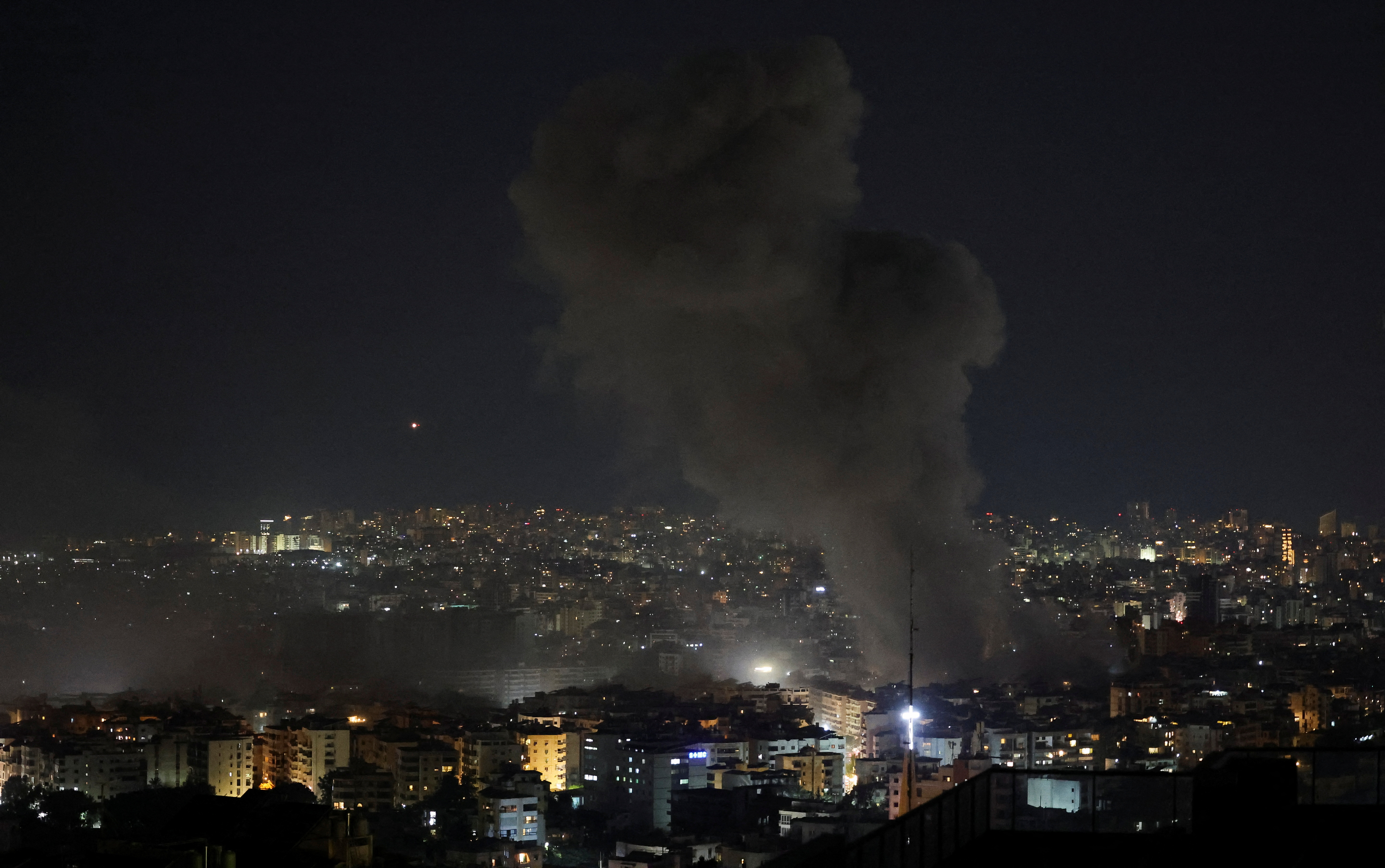 Israeli strike on Beirut's southern suburbs, after the Israeli military issued an evacuation warning for the area, as seen from Baabda