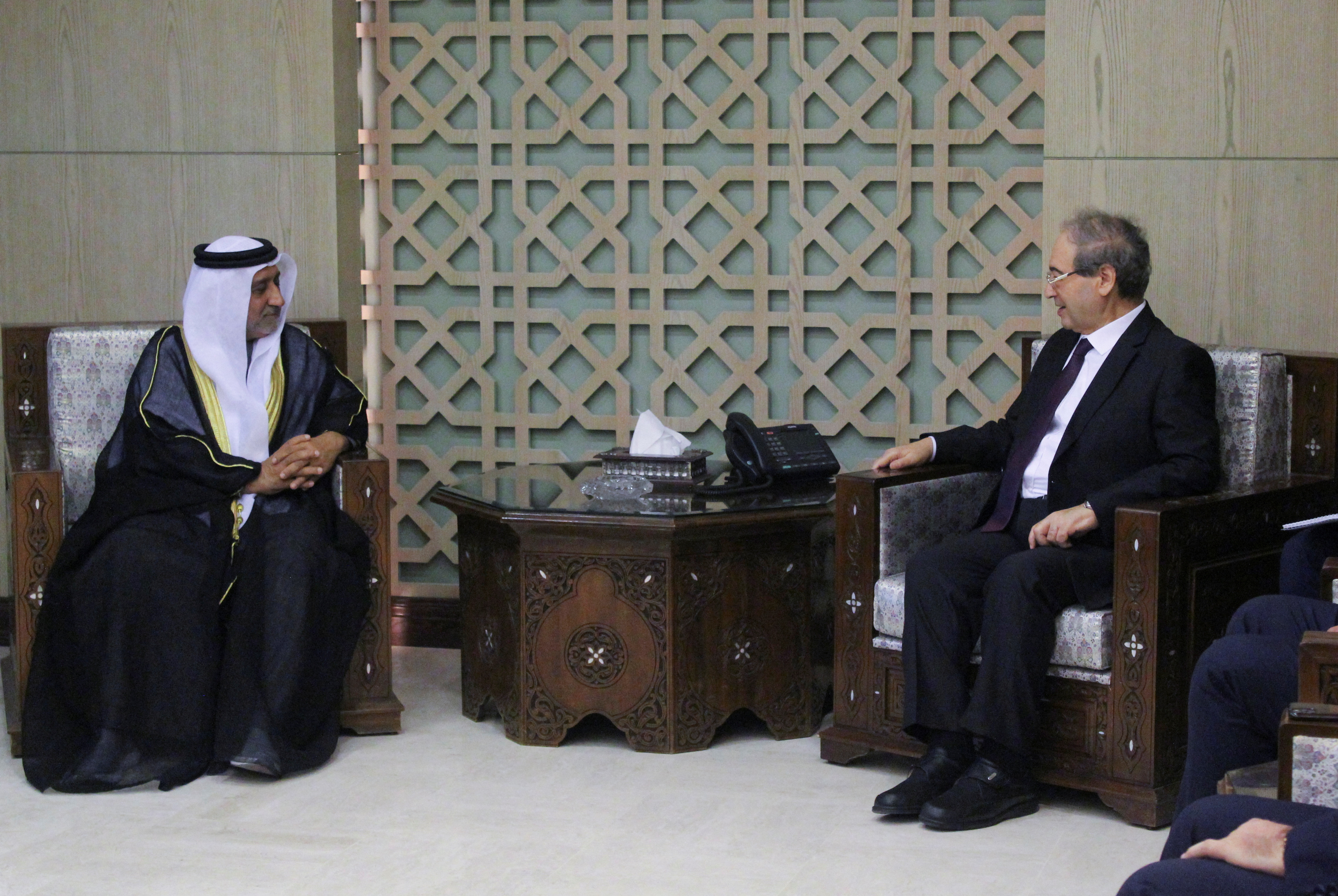 Syrian Foreign Minister Faisal Mekdad meets with new ambassador of the United Arab Emirates to Syria, Hassan al-Shehi, in Damascus