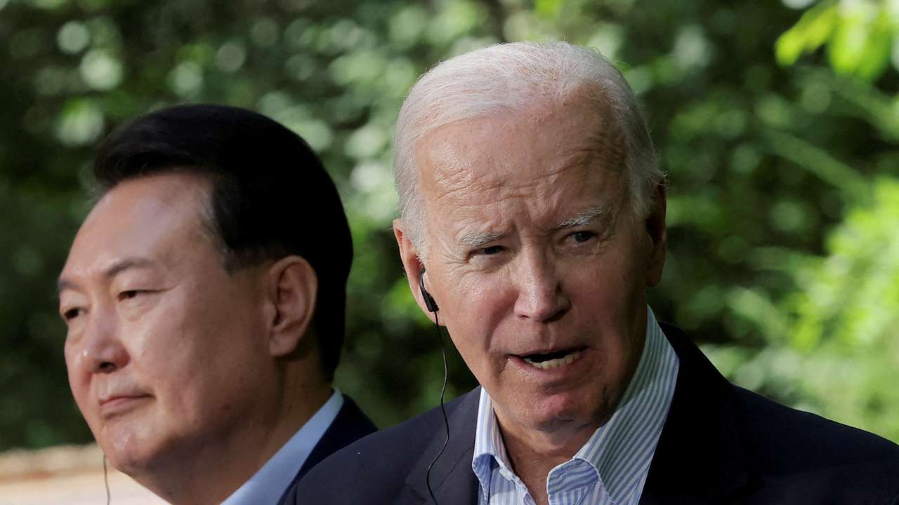 FILE PHOTO: Then-U.S. President Joe Biden and South Korea's President Yoon Suk at Camp David, Maryland