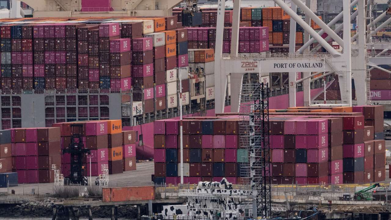 FILE PHOTO: A cargo ship full of shipping containers is seen at the port of Oakland as trade tensions escalate over U.S. tariffs