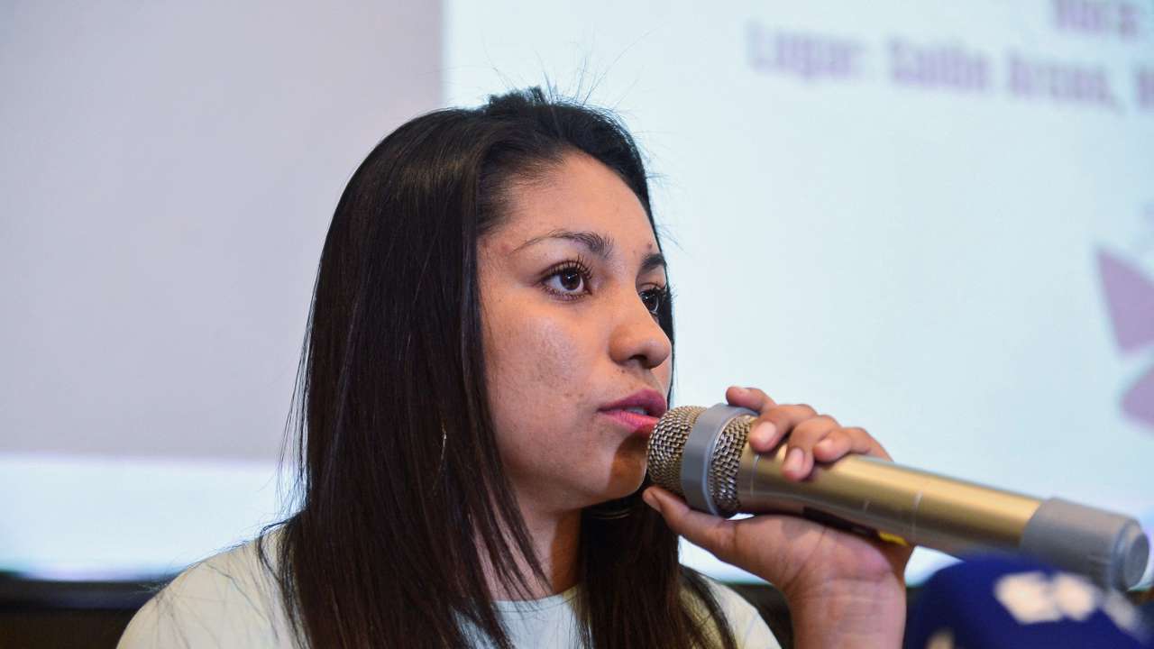 Lilian, a woman sentenced to 30 years in prision holds a press conference after her release, in San Salvador