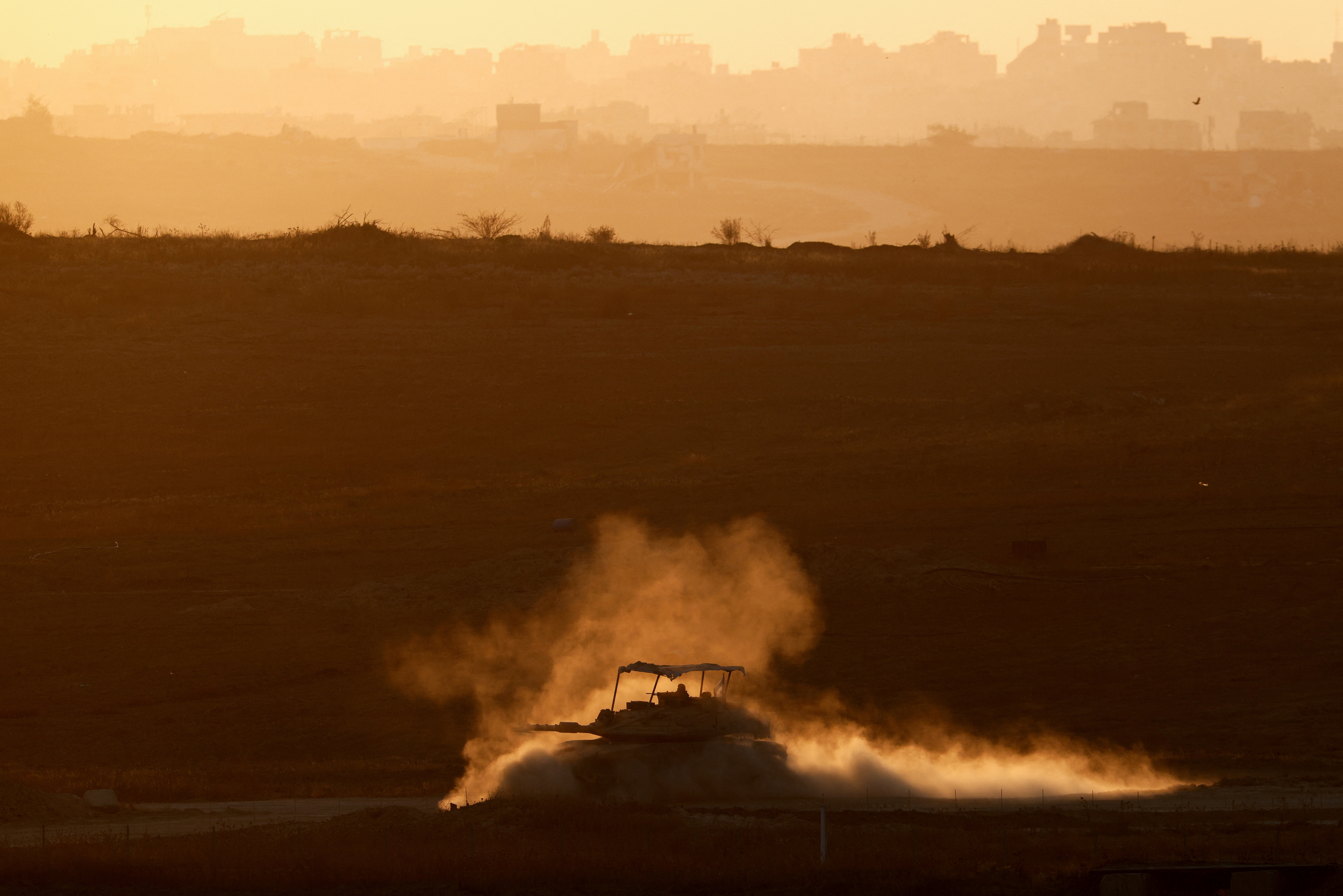 An Israeli tank manoeuvres in Gaza