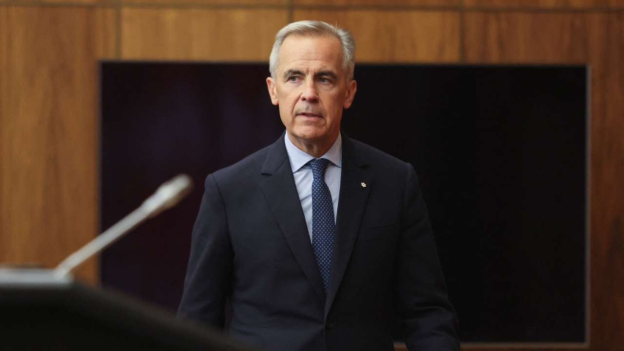Canada's Prime Minister Mark Carney arrives at a press conference to make an announcement on recognizing Palestinian statehood, in Ottawa