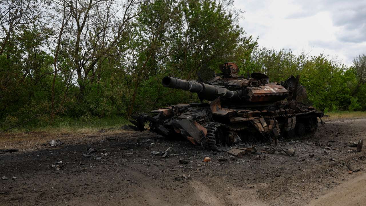 Destroyed tank is seen on a road in Kharkiv region
