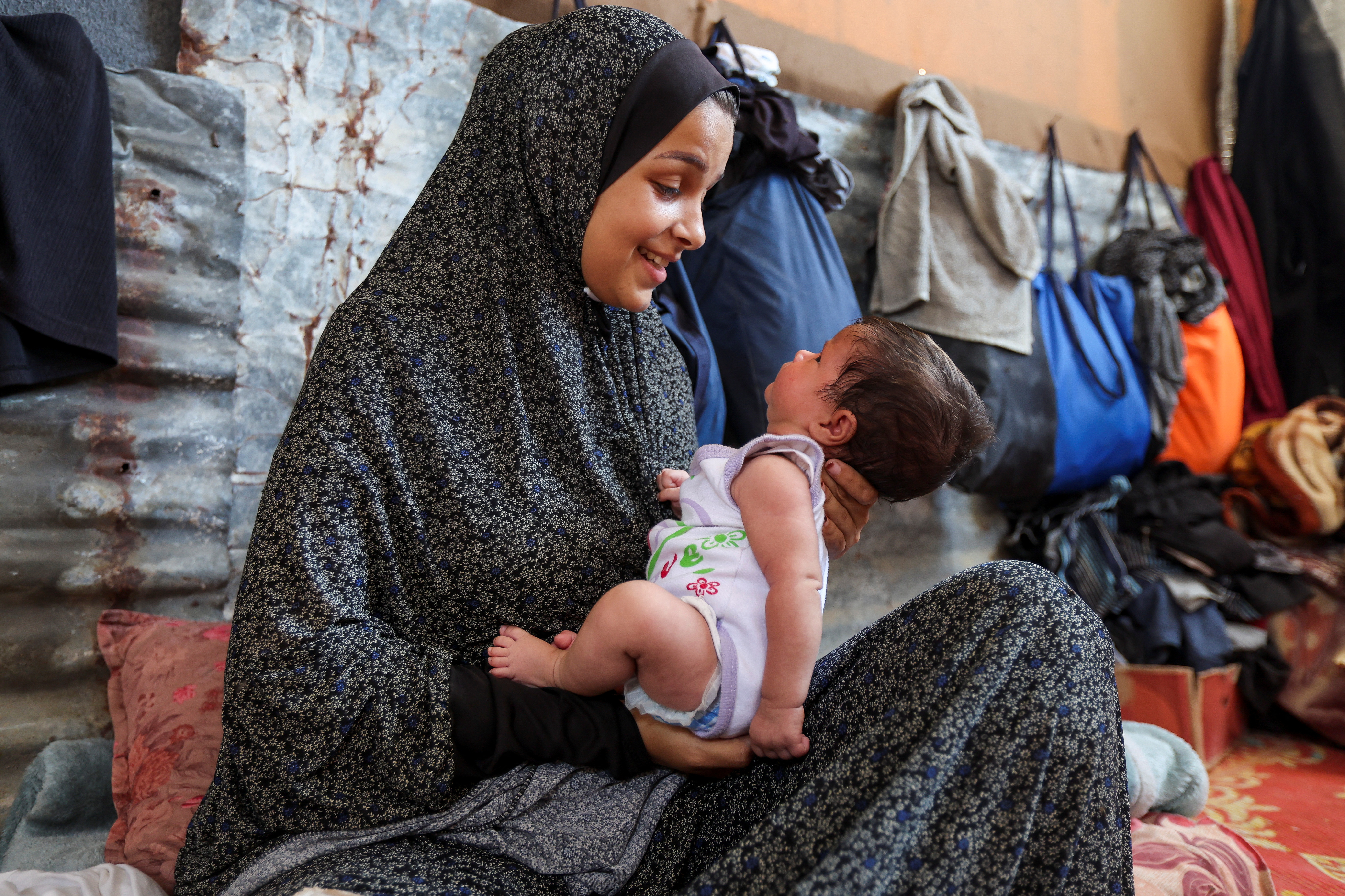 Gaza mothers recall challenges of raising newborns amid war