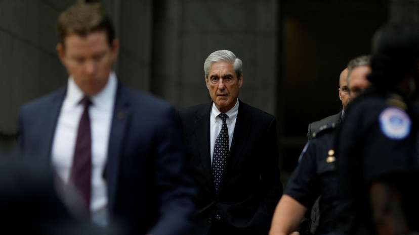 FILE PHOTO: Former Special Counsel Robert Mueller departs from the U.S. Capitol following his testimonies before the House of Representatives, on Capitol Hill in Washington