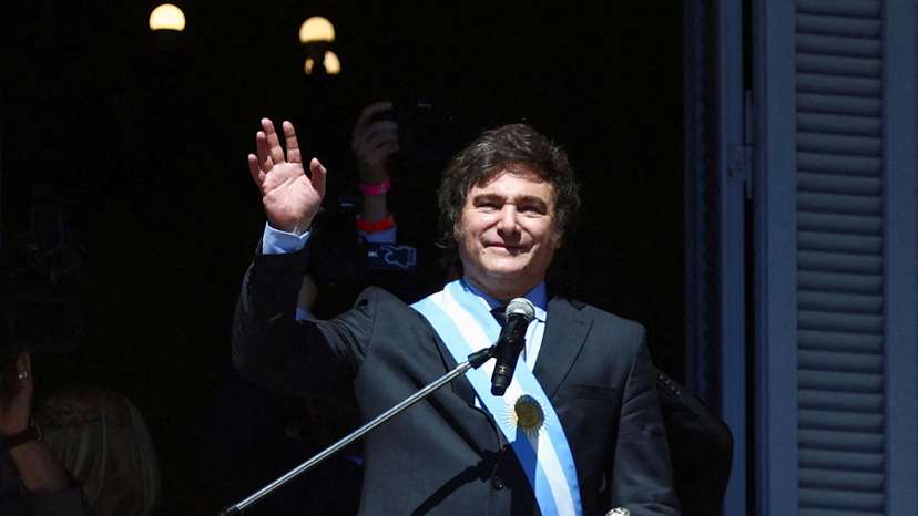 FILE PHOTO: Argentina's President Milei's waves to crowd after swearing-in ceremony in Buenos Aires