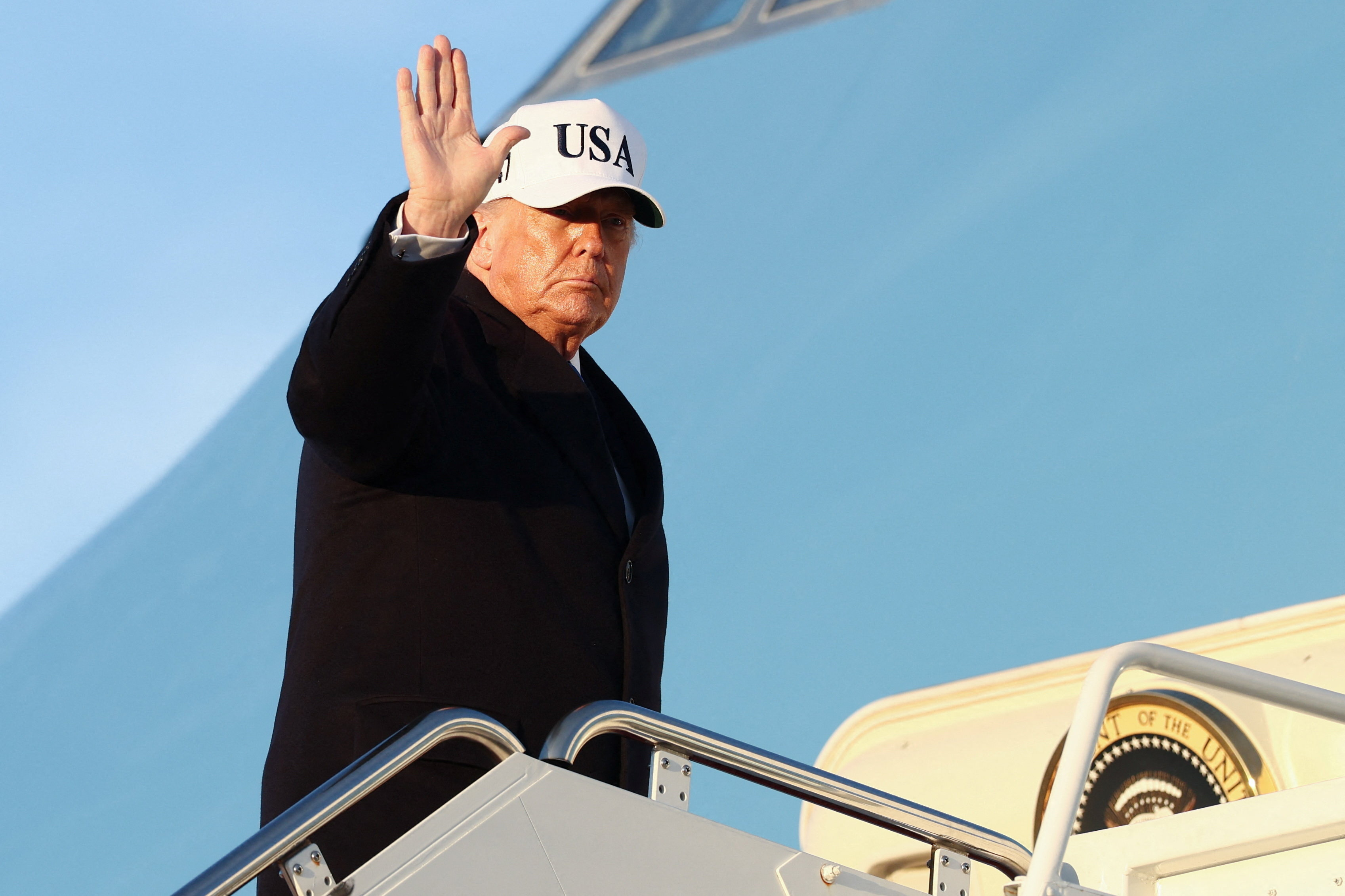 U.S. President Trump boards Air Force One for travel to Florida, at Joint Base Andrews
