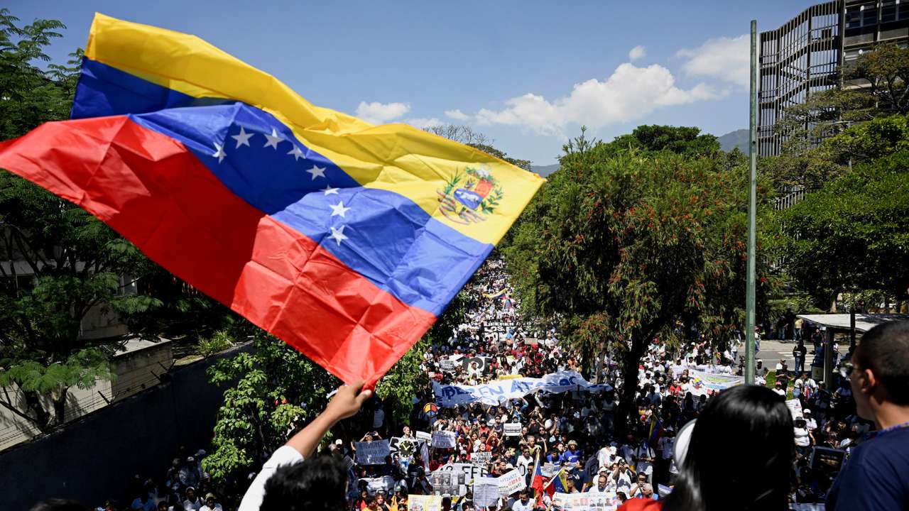 Venezuelan students and relatives of prisoners mark Youth Day with march for political amnesty, in Caracas
