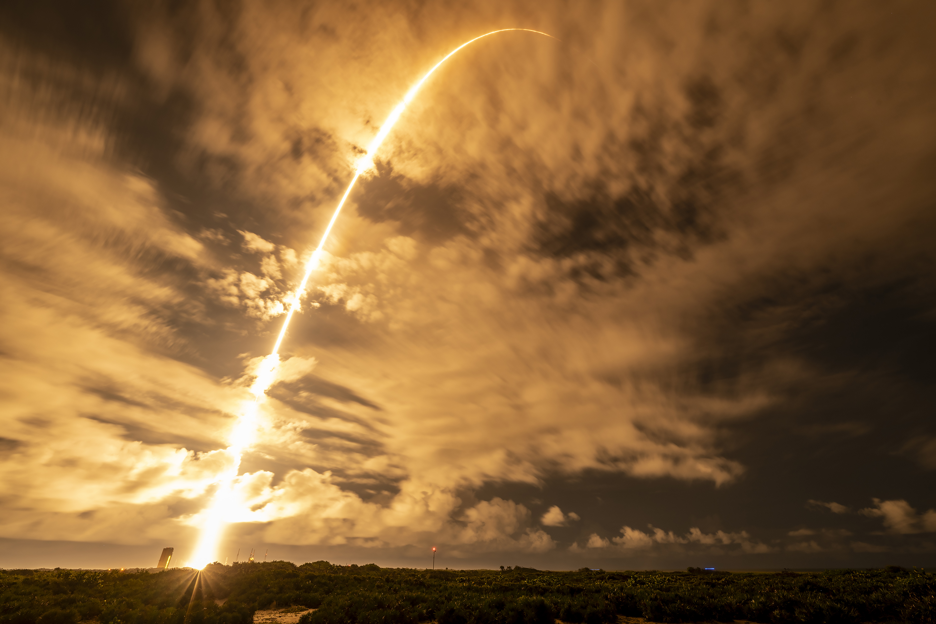 A SpaceX Falcon 9 rocket lifts off from Kennedy Space Center in Cape Canaveral.