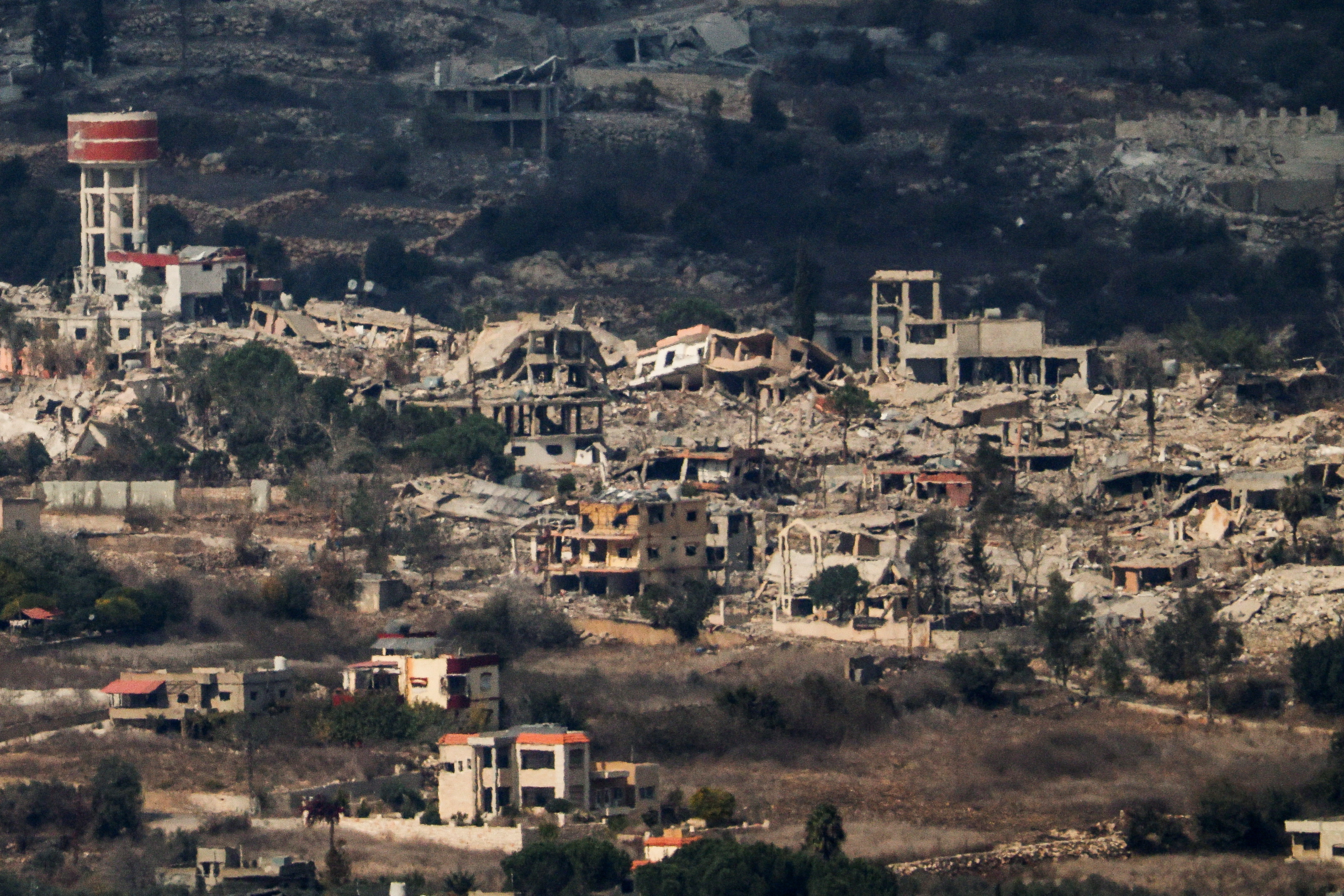 View shows destroyed buildings on the Lebanon's side of the border with Israel, as seen from Mount Addir