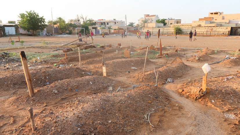 Graves are seen in residential area in Omdurman, Sudan